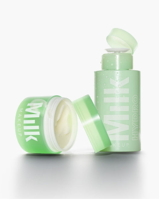 Milk Makeup Hydro Ungrip Cleansing Balm and Cleansing Water uncapped next to each other